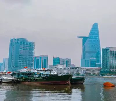 Modern City and Boats on the Sea in Ho Chi Minh.