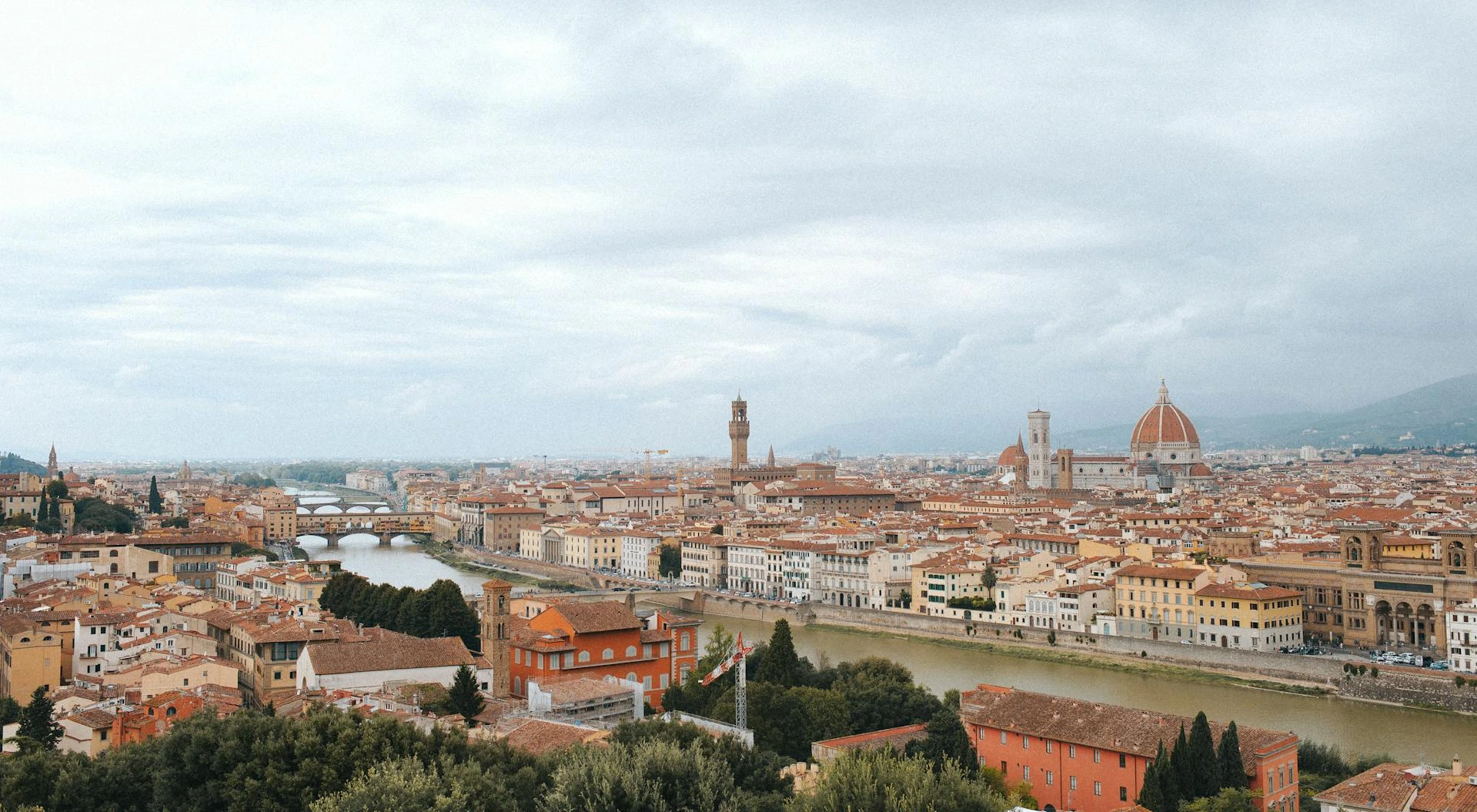 Aerial shot of city houses and buildings in Florence, Italy. 