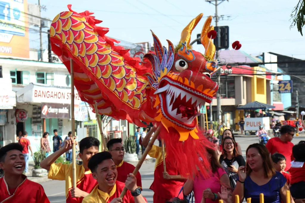 83213360_479347409417175_2370092382772264960_n - Travelpreneur People doing a dragon dance during a Chinese New Year Celebration in Davao City.