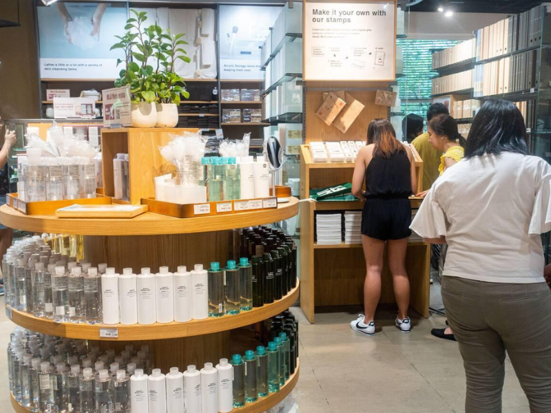 Shoppers browsing a modern store with well-organized shelves