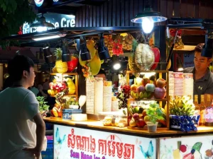 Fruit juice stall in Siem Reap’s night market, displaying colorful fruits and fresh beverages
