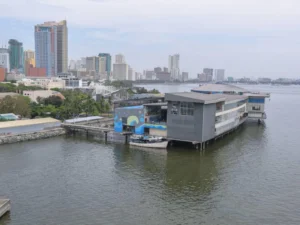 Aerial view of Manila Ocean Park with city skyline background