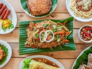 1k - Travelpreneur pancit habhab on a banana leaf surrounded by other traditional lucban foods