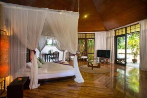 mandala spa and resort - Travelpreneur a beautiful room with big windows and doors