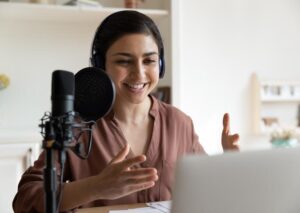 5 voice work - Travelpreneur a woman doing voice over work at the comfort of her own home