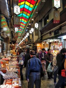 Foodicles-Kyoto-Nishiki-Market-7 - Travelpreneur a bustling street at nishiki market