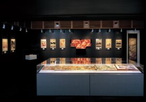 a picture of a room at kyoto national museum full of exhibit art displayed 