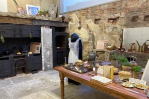 Highcliffe Castle interior exhibit of vintage furnitures and clothes