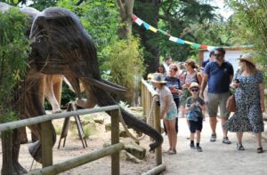Sudeley Castle Trail with animal statues and visitor with children are seen enjoying.