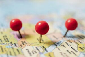 a6 - Travelpreneur a map with red pin on different locations