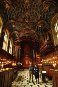 Hampton Court Interior with 2 people walking the hallway