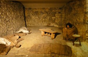Norwich Castle Dungeon with exhibit model and furniture