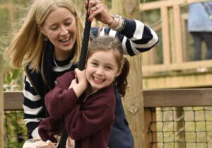 Belvior castle playground where a mother and daugther are having fun