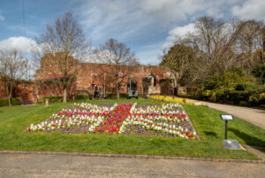 Shrewsbury Castle Garden with flowers planted to mimic the England flag