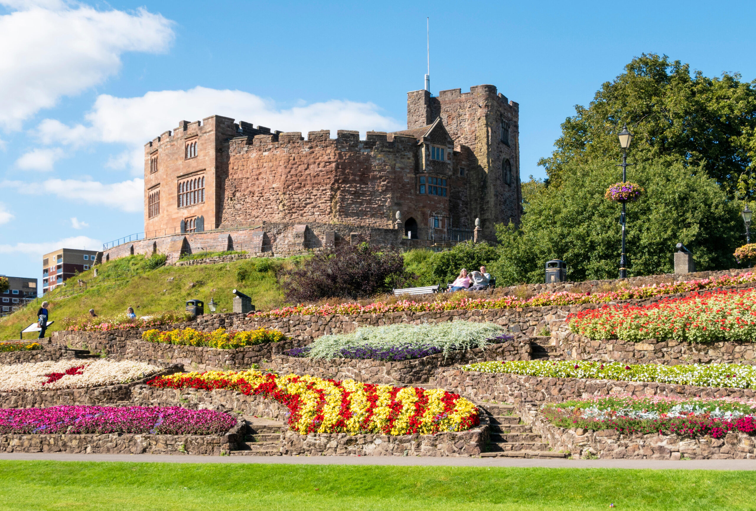 Tamworth Castle grounds and garden full of flowers in bloom