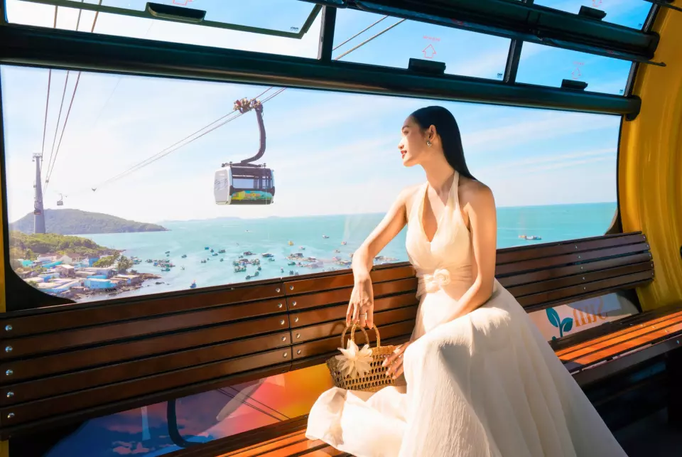 a woman riding the cable cart at Phu Quoc Island